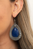 Paparazzi Western Fantasy - Blue Earrings - Chiseled into a tranquil teardrop, a shimmery French Blue stone bead is pressed into the center of a rustically studded silver frame radiating with antiqued detail for a southwestern flair. Earring attaches to a standard fishhook fitting.