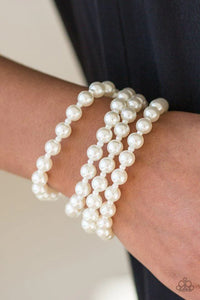 Paparazzi Work The BALLROOM - White Bracelet - Rows of dainty and classic white pearls are strung across the wrist for a timeless look. Features an adjustable Silver clasp closure.