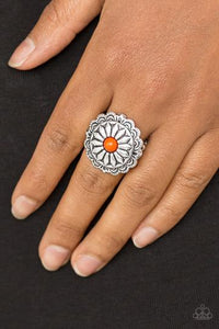 Paparazzi Daringly Daisy - Orange A hearty orange bead is pressed into a glistening silver frame radiating into a floral detail for a seasonal look. Features a stretchy band for a flexible fit.
