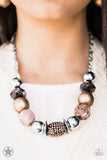 Paparazzi Blockbuster A Warm Welcome - Necklace - Warm beads in shades of brown and copper with reflective faceted edges and varying glazed finishes are offset by two shiny silver beads. An oblong bead studded with copper-toned rhinestones adds a dramatic accent. Features an adjustable clasp closure.