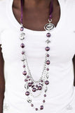 Paparazzi All The Trimmings - Purple A silky purple ribbon replaces a traditional chain to create a timeless look. Pearly deep purple beads and funky silver pieces intermix with varying lengths of silver chains to give a fresh take on a Victorian-inspired piece.


