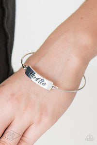 Paparazzi Hustle Hard - Silver - Bracelet  -  Engraved with the inspiring word "Hustle", a shimmery silver plate attaches to a skinny silver bar, creating a dainty bangle.