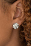 Paparazzi Wicked Glow - White A beveled silver frame is encrusted in glittery white rhinestones, creating blinding shimmer. Earring attaches to a standard post fitting.

