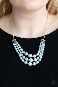 Paparazzi Spring Social - Blue  -  Varying in size, three strands of timeless blue pearls swing from the bottom of a shimmery silver chain. Dainty crystal-like beads are sprinkled between the pearl accents, adding classic shimmer to the elegant palette. Features an adjustable clasp closure.
