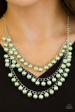 Paparazzi Chicly Classic - Green Classic green pearls trickle from three shimmery chains below the collar, adding a timeless twist to a traditional pearl palette. Features an adjustable clasp closure.

