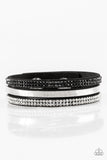 Paparazzi I Mean Business - Black - Bracelet  -  A black suede band is spliced into three strands featuring rows of glittery black rhinestones, flat silver chain, and glassy white rhinestones for a glamorous look. Features an adjustable snap closure.

