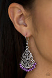 Paparazzi BAROQUE The Bank - Purple Dainty purple pearls swing from the bottom of an ornate silver teardrop, creating a colorful fringe. Dainty white rhinestones are sprinkled across the frame for a refined finish. Earring attaches to a standard fishhook fitting.

