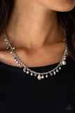 Paparazzi Spring Sophistication - Brown Pearly brown and crystal-like beads trickle from a silver chain, creating a bubbly fringe below the collar. Faceted silver teardrops drip between the colorful beading, adding timeless shimmer to the seasonal look. Features an adjustable clasp closure.

