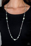 Paparazzi Magnificently Milan - Green Pearly green, faceted and opaque crystal-like beads trickle along an elegantly elongated silver chain for a refined look. Features an adjustable clasp closure.

