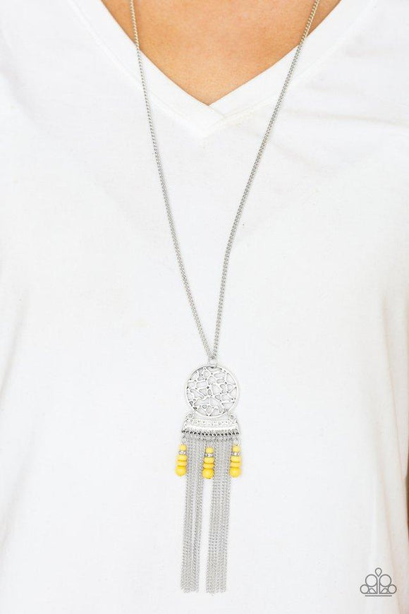 Paparazzi Western Wayward - Yellow Featuring a dream-catcher pattern, a shimmery silver frame swings from the bottom of an elongated silver chain. Stacked yellow beads and shimmery silver chains stream from the bottom of the pendant, creating a whimsical fringe. Features an adjustable clasp closure.

