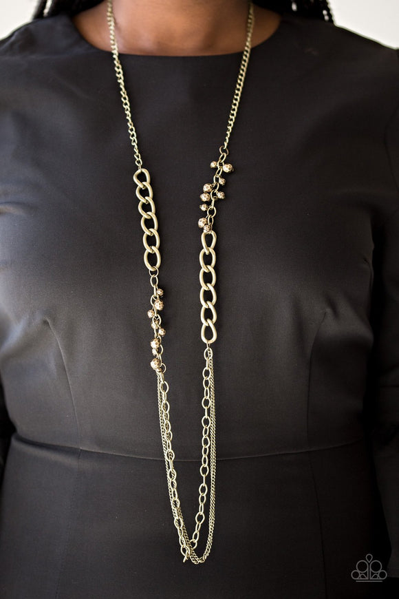 Paparazzi Mega Megacity- Brass Sections of bold brass chain and faceted brass beads give way to mismatched brass chains, layering down the chest in a bold industrial fashion. Features an adjustable clasp closure.
