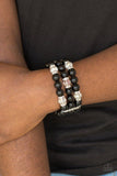 Paparazzi Undeniably Dapper - Black  -  Pinched between white rhinestone encrusted frames, white rhinestone encrusted rings, crystal-beads, and shiny black beads are threaded along elastic stretchy bands for a glamorous look.
