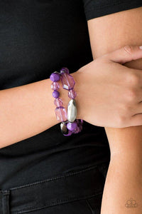 Paparazzi Rockin Rock Candy - Purple Mismatched gunmetal, polished purple, and crystal-like beads are threaded along interlocking stretchy bands for a whimsical look.
