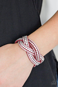 Paparazzi Bring On The Bling - Red Varying in size, glassy white rhinestones are encrusted along interwoven red suede bands, creating blinding shimmer across the wrist. Features an adjustable snap closure.

