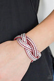 Paparazzi Bring On The Bling - Red Varying in size, glassy white rhinestones are encrusted along interwoven red suede bands, creating blinding shimmer across the wrist. Features an adjustable snap closure.

