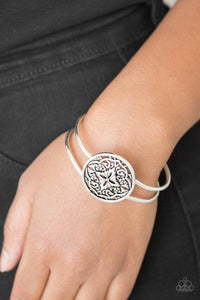 Paparazzi Mandala Majesty - Silver Brushed in a high-sheen finish, shiny silver filigree spins into a mandala like frame atop a dainty cuff for a whimsical look. Features a hinged closure.