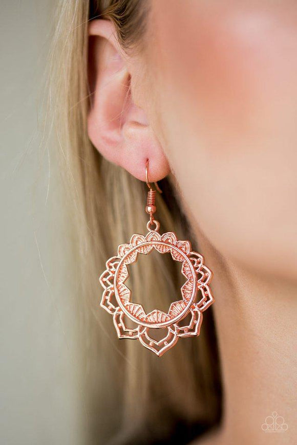 Paparazzi Modest Mandalas - Copper Brushed in a high-sheen finish, shiny copper petals bloom from an ornate shiny copper hoop for a whimsical look. Earring attaches to a standard fishhook fitting.

