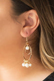 Paparazzi New York Attraction - Gold Infused with a bubbly pearl fringe, a double hoop frame swings from the ear. A solitaire pearl swings from the top of the joined hoops for a refined finish. Earring attaches to a standard fishhook fitting.

