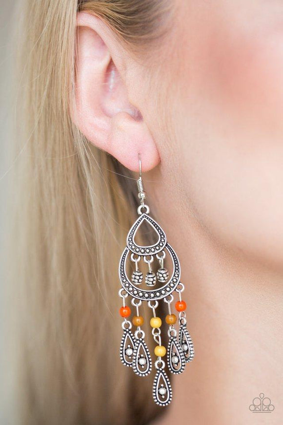 Paparazzi Eastern Excursion - Multi Dotted with robust multicolored beading, ornate silver teardrop frames swing from the bottom of a studded silver frame, creating a whimsical fringe. Earring attaches to a standard fishhook fitting.
