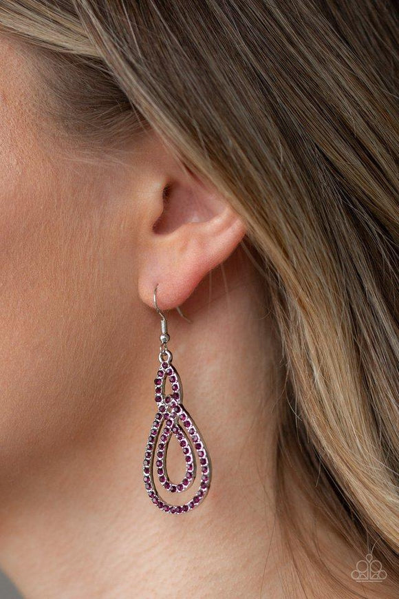 Paparazzi Sassy Sophistication - Purple  -  Encrusted in glittery purple rhinestones, ribbons of shimmery silver loop into an elegant lure for a timeless look. Earring attaches to a standard fishhook fitting.
