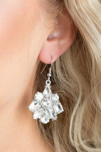 Paparazzi Fiercely Famous - White Varying in cut and shimmer, glittery white rhinestones coalesce into a blinding lure for a dramatic look. Earring attaches to a standard fishhook fitting.

