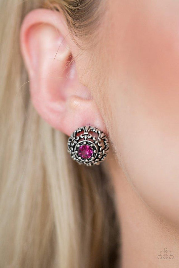 Paparazzi Courtly Courtliness - Pink A glittery pink rhinestone dots the center of a shimmery silver frame swirling with regal filigree detail for a refined look. Earring attaches to a standard post fitting.

