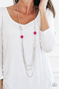 Paparazzi Margarita Masquerades - Pink  -  Faceted Granita beads and hammered silver hoops gives way to layers of mismatched silver chains for a whimsical look. Features an adjustable clasp closure.
