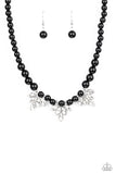 Paparazzi Society Socialite - Black - Necklace  -  A strand of shiny black beads drapes elegantly below the collar. Featuring regal marquise style cuts, glittery white rhinestone frames swing from the beaded strand for a timeless finish. 