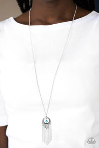 Paparazzi Western Weather - Blue A refreshing turquoise stone bead swings from the top of an ornate silver frame. Infused with a tapered tassel, the whimsical pendant swings from the bottom of an elongated silver chain for a wanderlust finish. Features an adjustable clasp closure.

