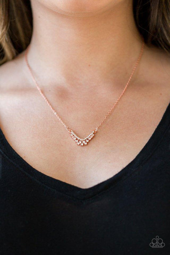 Paparazzi Classically Classic - Copper  -  Encrusted in glassy white rhinestones, a dainty shiny copper pendant delicately bows below the collar in a timeless fashion. Features an adjustable clasp closure.
