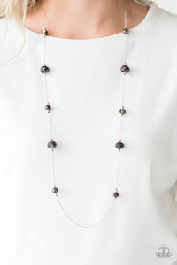 Paparazzi Champagne On The Rocks - Multi - Necklace  -  Infused with dainty silver accents, iridescent crystal-like beads trickle along a dainty silver chain across the chest for a refined look. Features an adjustable clasp closure.
