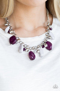 Paparazzi Grand Canyon Grotto - Multi Featuring polished and cloudy finishes, a collection of purple and gray faux rocks dance from the bottom of a bold silver chain. Classic silver beads trickle between the colorful beading, adding a metallic shimmer to the whimsical fringe. Features an adjustable clasp closure.
