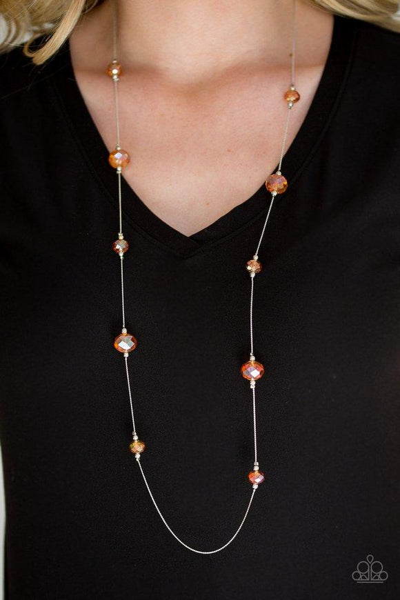 Paparazzi Champagne On The Rocks - Orange Infused with dainty silver accents, glittery orange crystal-like beads trickle along a dainty silver chain across the chest for a refined look. Features an adjustable clasp closure.


Featured inside The Preview at ONE Life!
