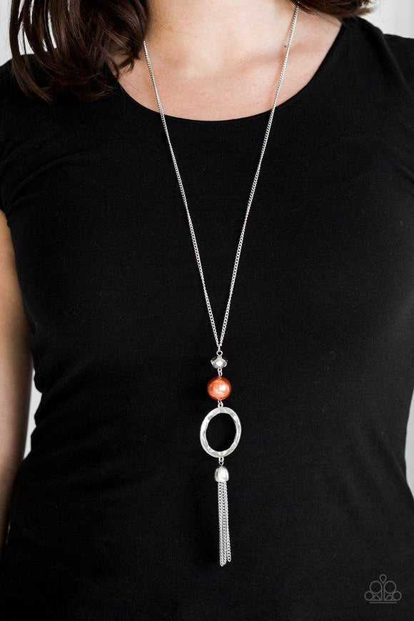 Paparazzi Bold Balancing Act - Orange Infused with a lengthened silver chain, a faceted crystal-like bead, an oversized pearly orange bead, and a hammered silver hoop give way to a shimmery silver tassel for a refined look. Features an adjustable clasp closure.

