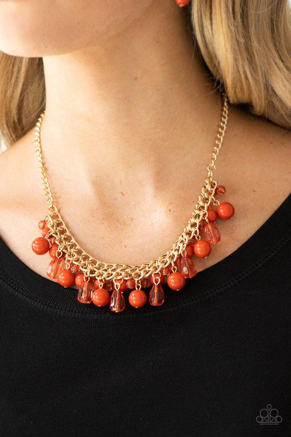 Paparazzi Tour de Trendsetter - Orange Varying in shape, glassy and polished orange beads swing from the bottom of interlocking gold chains. Crystal-like teardrops are sprinkled along the colorful beading, creating a flirtatious fringe below the collar. Features an adjustable clasp closure.

