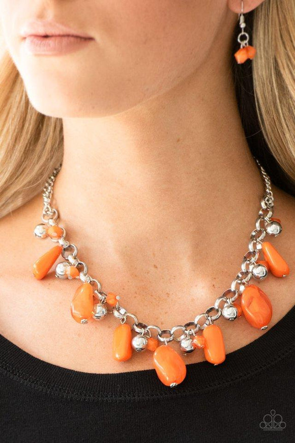Paparazzi Grand Canyon Grotto - Orange Featuring polished and cloudy finishes, a collection of Turmeric faux rocks dance from the bottom of a bold silver chain. Classic silver beads trickle between the colorful beading, adding a metallic shimmer to the whimsical fringe. Features an adjustable clasp closure.

