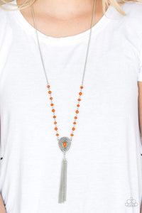 Paparazzi Soul Quest - Orange Polished and crystal-like orange beads trickle along a shimmery silver chain, giving way to a glistening teardrop pendant. Infused with studded detail and a matching orange beaded center, the ornate pendant gives way to a shimmery silver chain tassel for a wanderlust finish. Features an adjustable clasp closure.

