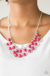 Paparazzi Really Rococo - Pink Polished pink beads and shimmery silver hoops drip from the bottom of a glistening silver chain, creating a playful fringe below the collar. Features an adjustable clasp closure.

