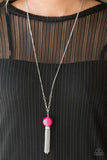 Paparazzi Belle of the BALLROOM - Pink A dramatic pearly Granita bead swings from the bottom of an elegantly elongated silver chain. Featuring a hammered fitting, a silver tassel streams from the bottom of the colorful pendant for a whimsical finish. Features an adjustable clasp closure.
