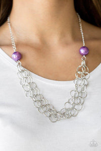 Paparazzi Daring Diva - Purple Two oversized purple pearls give way to dramatic silver chains, creating bold layers below the collar for a sassy look. Features an adjustable clasp closure.

