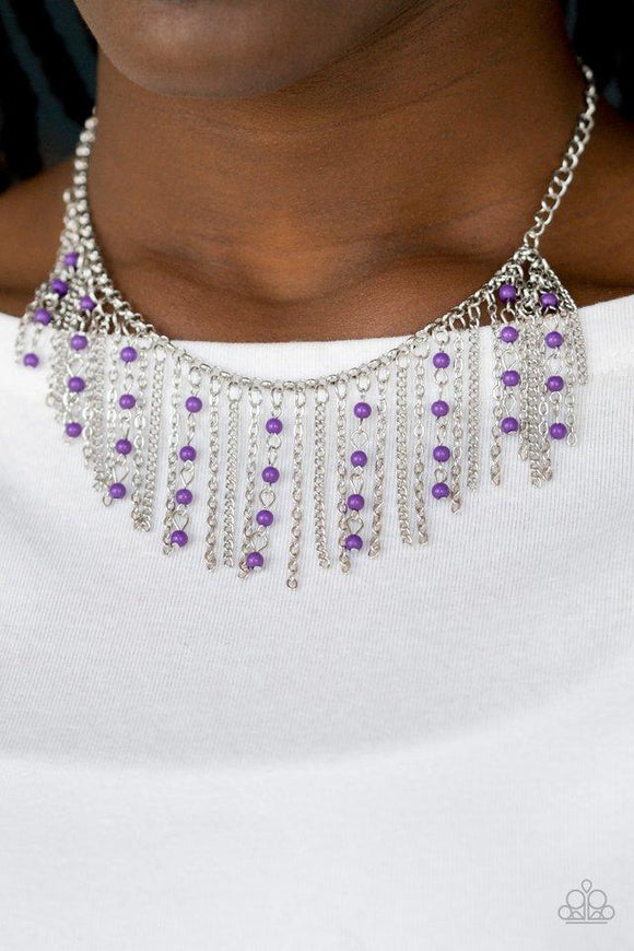 Paparazzi Harlem Hideaway - Purple  -  Infused with purple beaded tassels, shimmery silver chains stream below the collar, creating a colorful fringe. Features an adjustable clasp closure.
