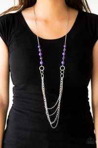 Paparazzi Vividly Vivid - Purple Polished purple, faceted crystal-like and delicately hammered silver hoops give way to mismatched silver chains down the chest for a whimsical look. Features an adjustable clasp closure.

