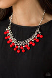 Paparazzi Friday Night Fringe - Red Rows of classic silver and fiery red beads trickle from two rows of interlocking silver chains, creating a bold colorful fringe below the collar. Features and adjustable clasp closure.

