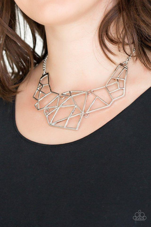 Paparazzi World Shattering - Silver Shattered silver plates link below the collar, coalescing into an edgy geometric pendant. Features an adjustable clasp closure.
Featured inside The Preview at ONE Life!
