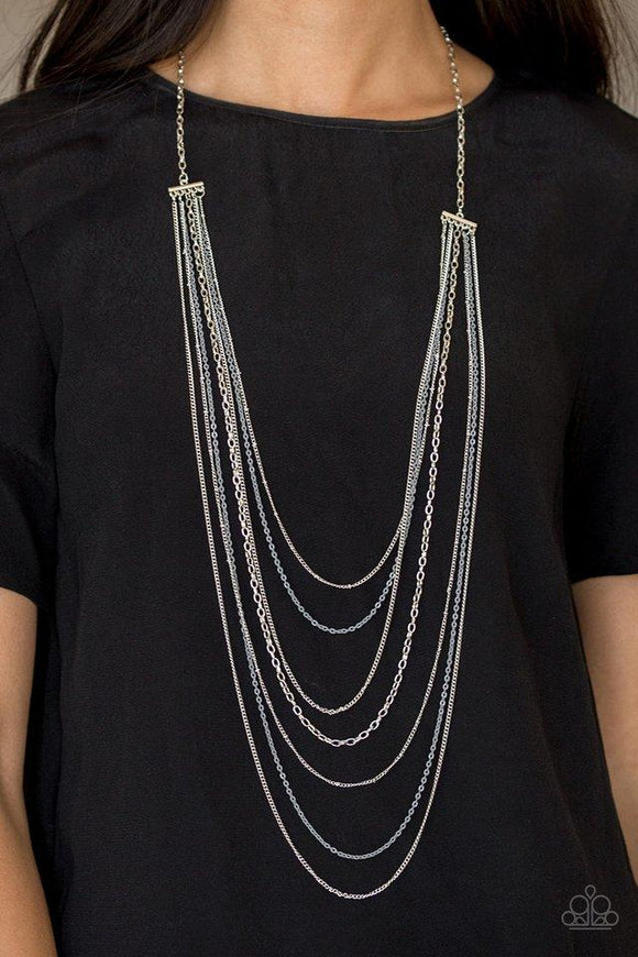 Paparazzi Radical Rainbows - Silver Mismatched silver chains alternate with dainty gray chains down the chest, creating a colorful industrial look. Features an adjustable clasp closure.

