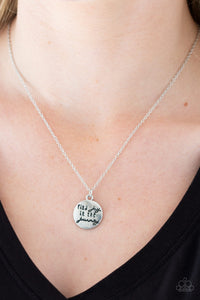 Paparazzi Find Joy - Silver - Necklace  -  Stamped in the inspirational phrase, "find joy in the journey," a round silver pendant swings below the collar for a seasonal look. Features an adjustable clasp closure.
