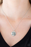 Paparazzi Find Joy - Silver - Necklace  -  Stamped in the inspirational phrase, "find joy in the journey," a round silver pendant swings below the collar for a seasonal look. Features an adjustable clasp closure.
