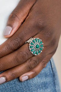 Paparazzi Poppy Pop-tastic - Green  -  Refreshing green beads spin around a studded silver frame, creating a colorful floral pattern atop the finger. Features a stretchy band for a flexible fit.
