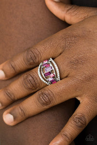 Paparazzi Treasure Chest Charm - Purple - Ring  -  White rhinestone encrusted bands flank a row of emerald cut glass beads in shades of purple for a regal look. Features a stretchy band for a flexible fit.
