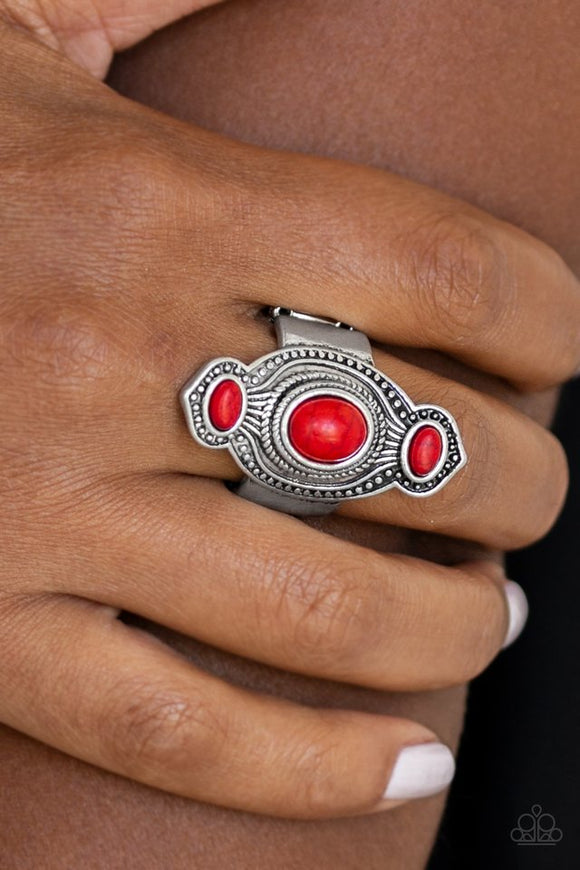 Paparazzi Dune Drifter - Red - Ring  -  Three fiery red stones are pressed into an abstract silver frame radiating with texture and studded details for a seasonal look. Features a stretchy band for a flexible fit.

